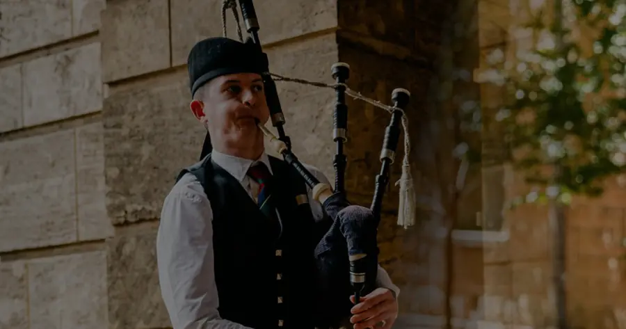 Charles Barblett playing the Highland bagpipes
